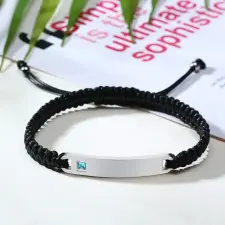Karkötőshop.hu Gravírozható textil karkötő kék cirkónia kővel – fekete karkötő