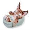 NICI : Alvó hiúz plüssfigura kosárban - 12 cm
