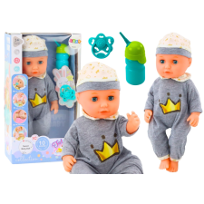  Pisilő baba szürke pizsamában baba