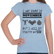 PRINTFASHION Novemberben születtem de minden hónapban egészségesen élek - Női póló - Világoskék